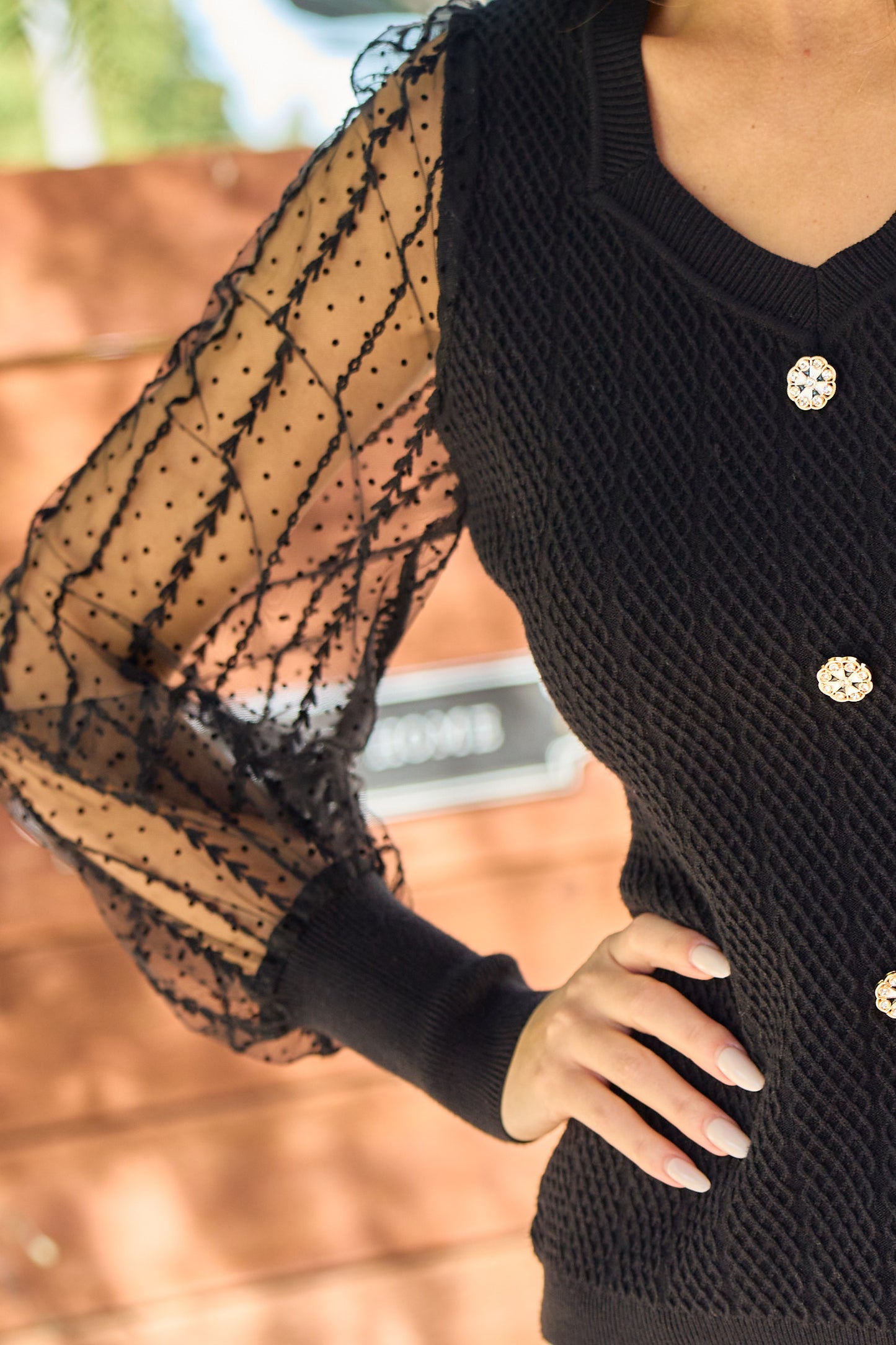 Elegant Knit Sweater with Sheer Polka Dot Sleeves